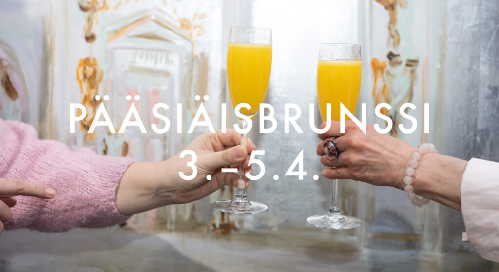 Kaksi ihmistä kilistelee mimosilla.