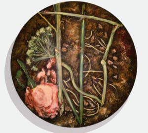 Pyöreä maalaus kukista ja kasveista maassa