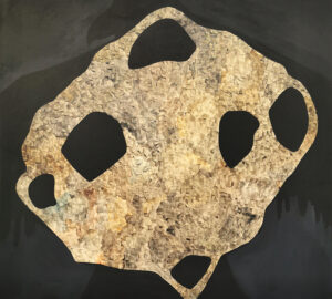 Abstrakti maalaus kivi täynnä reikiä