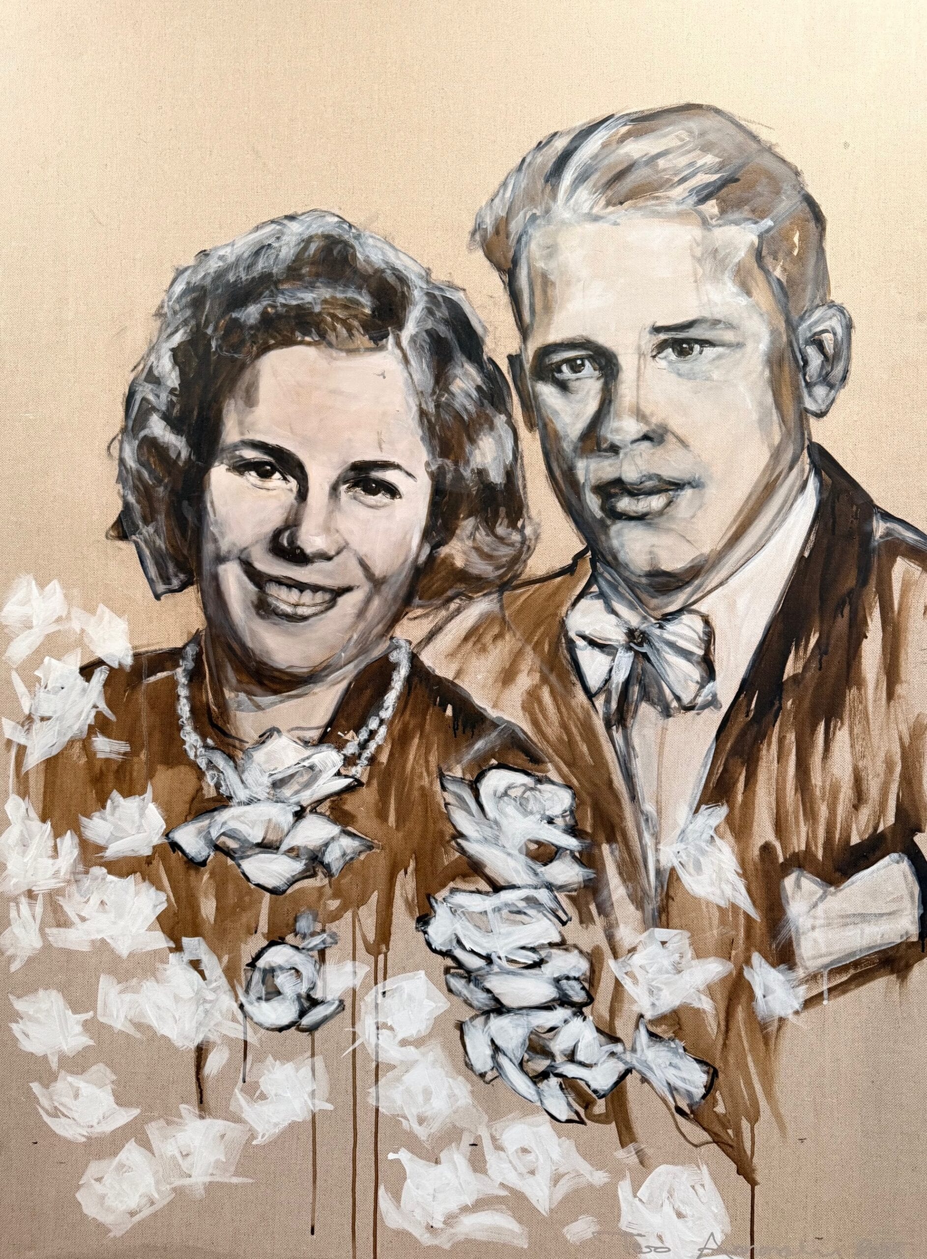 Muotokuva hymyilevästä pariskunnasta maalattuna kankaalle.