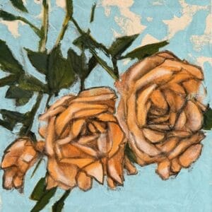 Kaksi oranssia ruusua sinisellä taustalla