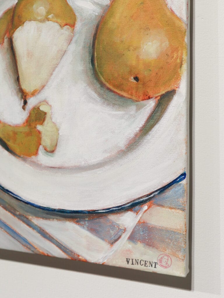 Maalaus kahdesta päärynästä valkoisella lautasella