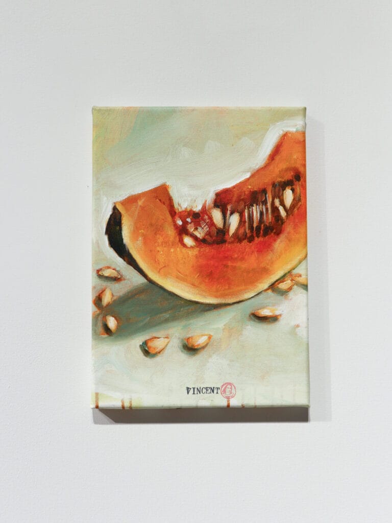 Maalaus kurpitsasta ja siemenistä.