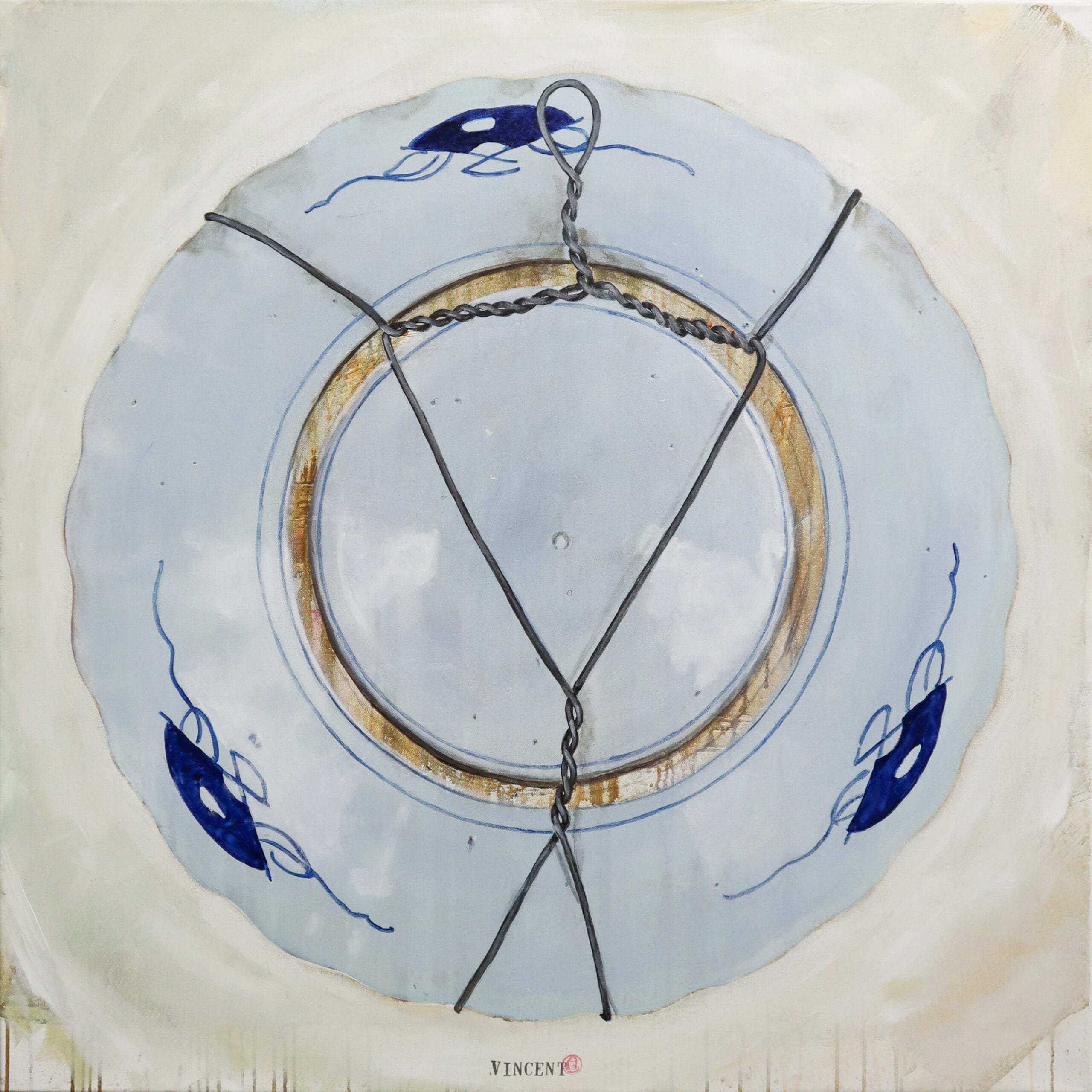 Sininen taidelautanen metallinaruilla