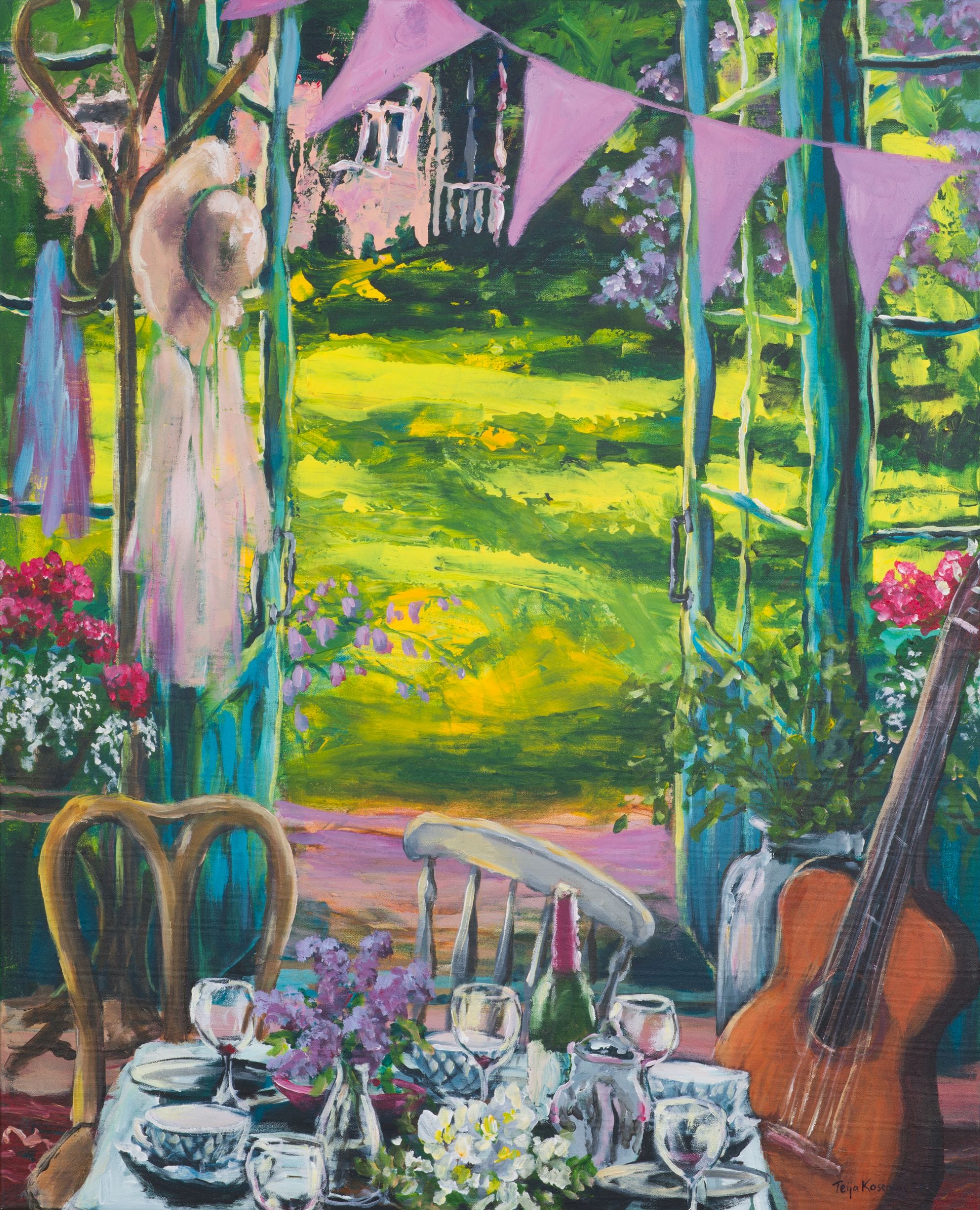 Kesäinen puutarhajuhla kukkien ja viinilasien kera