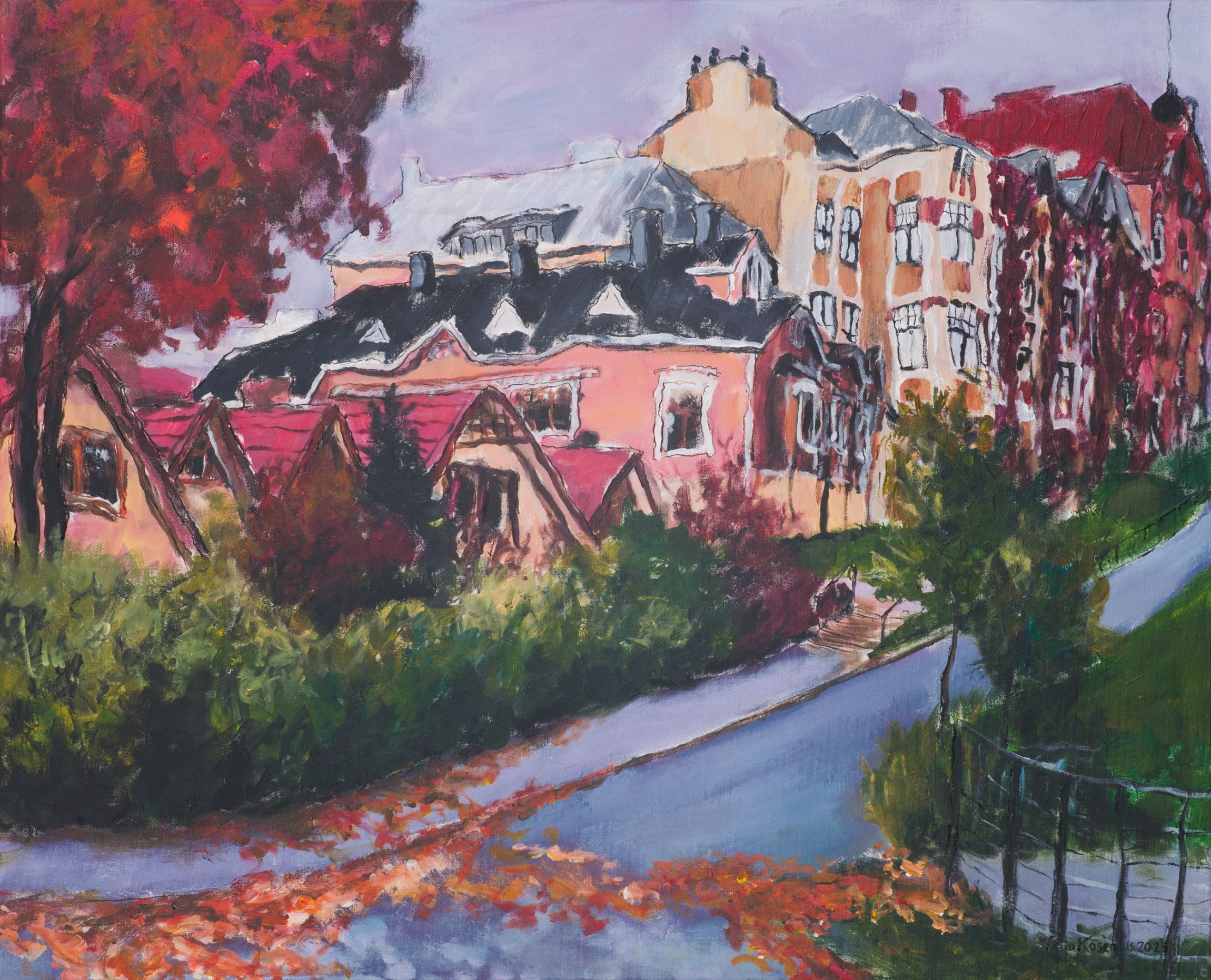 Syksyinen maisema punaisilla puutaloilla ja lehdillä.