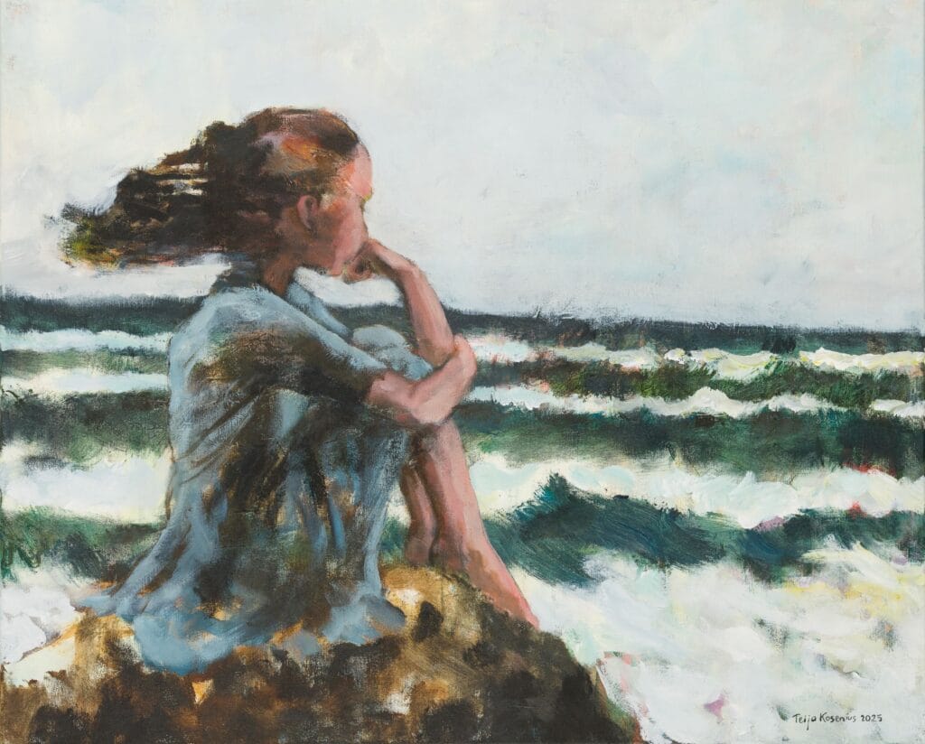 Ihminen istuu kalliolla katsellen merta ja aaltoja.