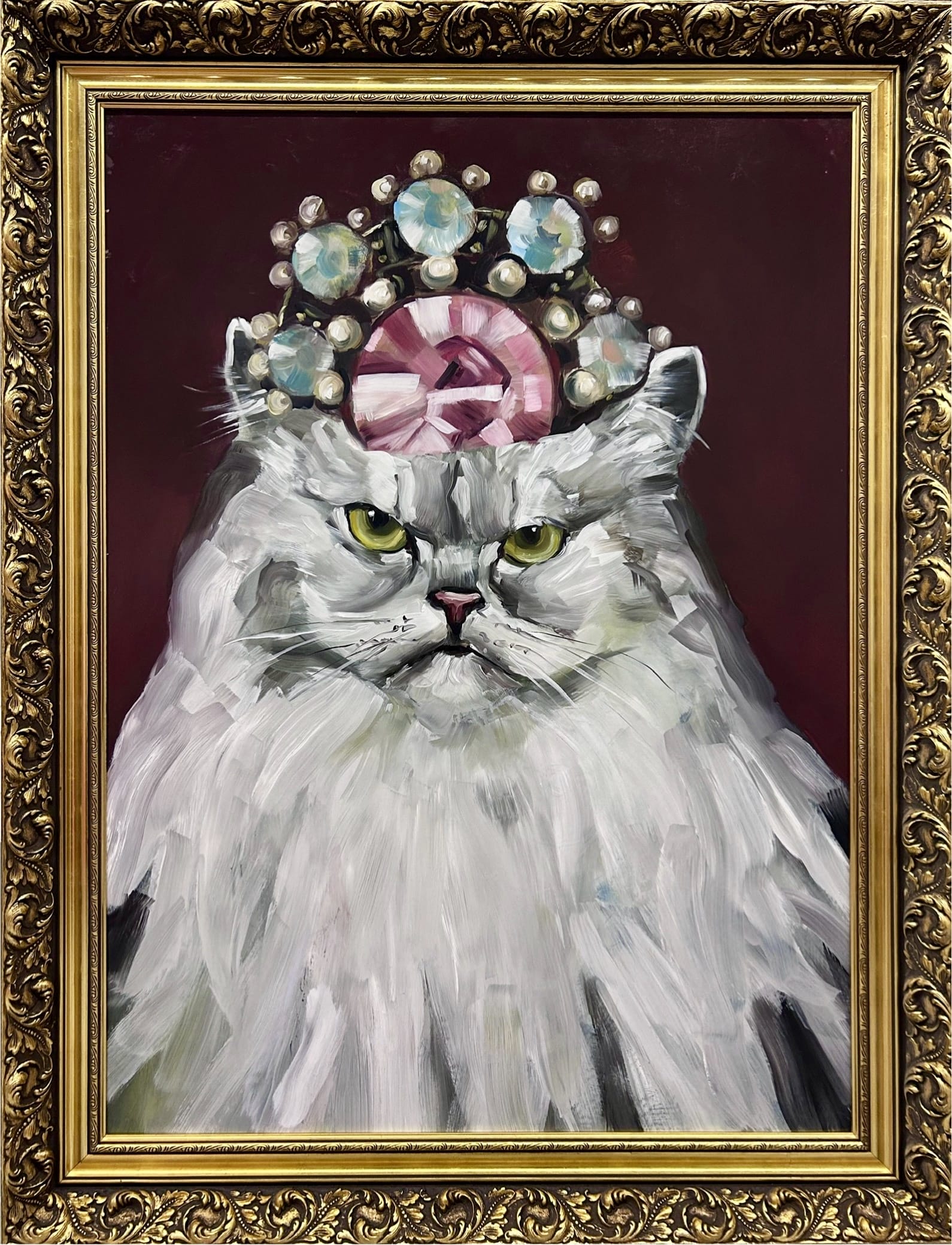 Kuningas kissa kruunulla, maalaus kehyksissä