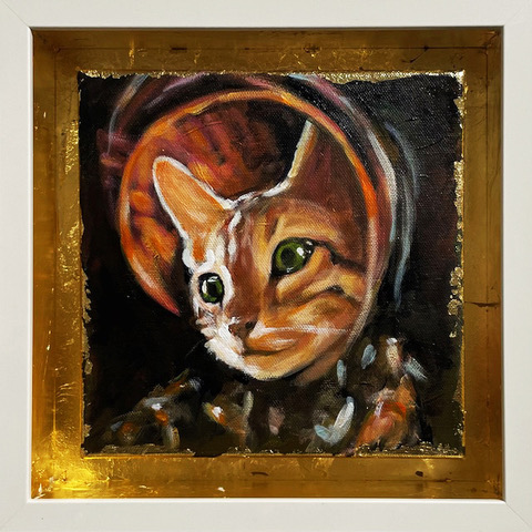 Kultareunuksinen kissa-aiheinen taideteos