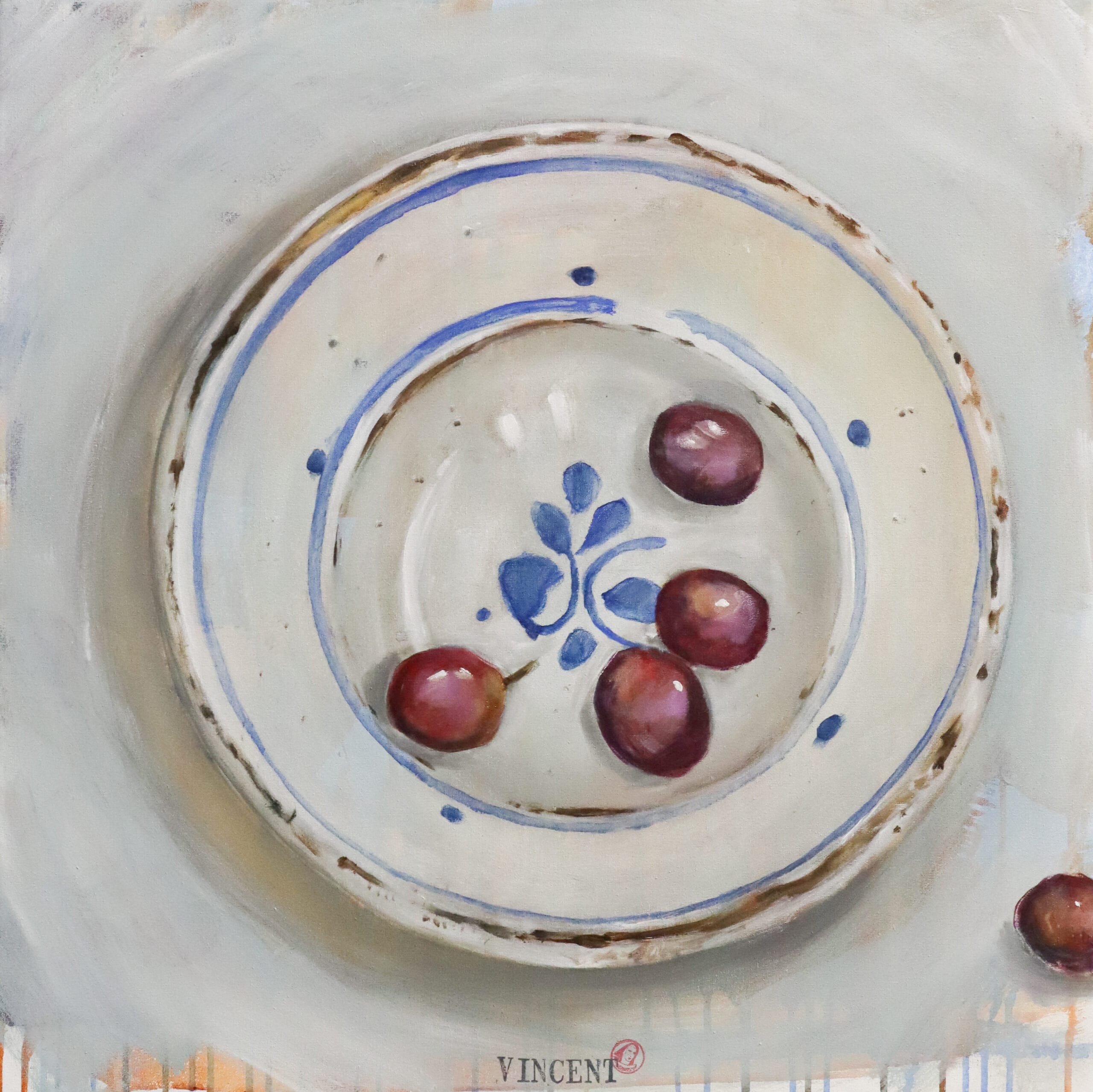 Maalaus viinirypäleistä koristeellisella lautasella