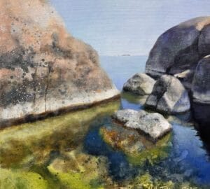 Maalattu kalliomaisema ja kirkas sininen meri.