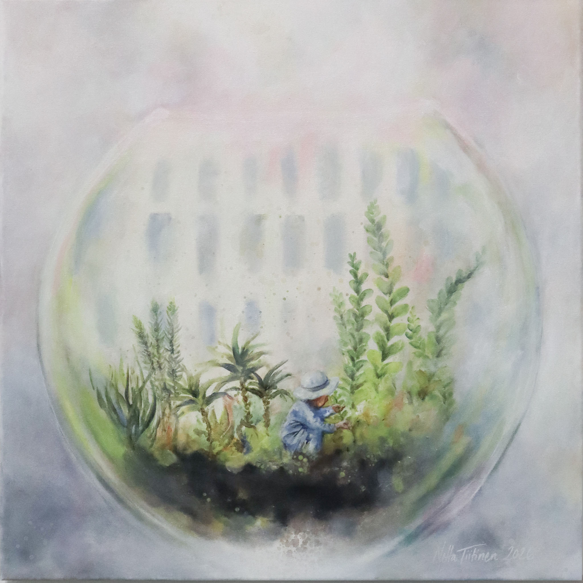 Taimenia hoitava henkilö lasipallossa